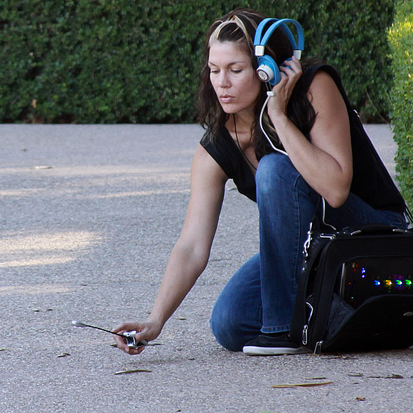 Pandora uses a special detector to search for ghost thoughts in Balboa Park, San Diego, in the cellphone adventure Giskin Anomaly.